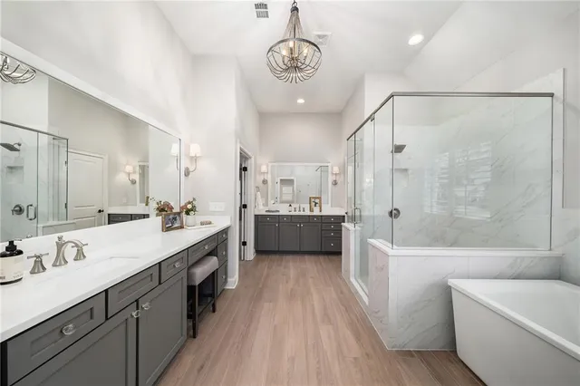 a view of a room with wooden floor and window