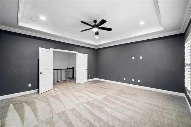 a view of a swimming pool with a yard