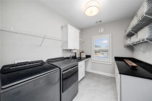 a house view with swimming pool and garden space