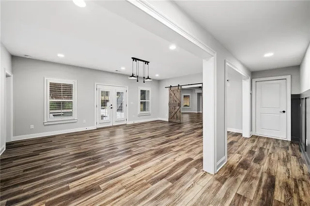 a view of a swimming pool with outdoor seating