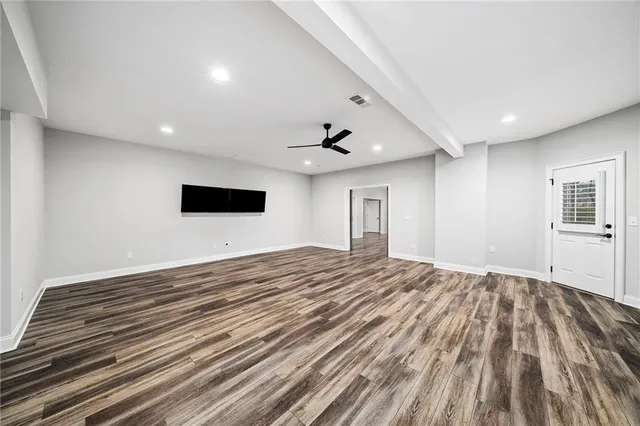 a view of a house with swimming pool and sitting area