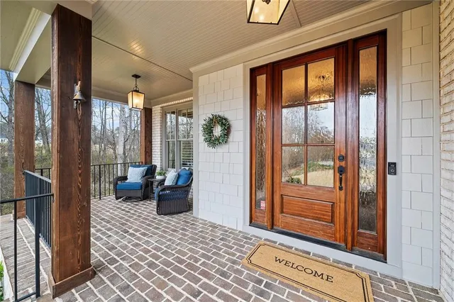 a view of a livingroom with furniture and a window
