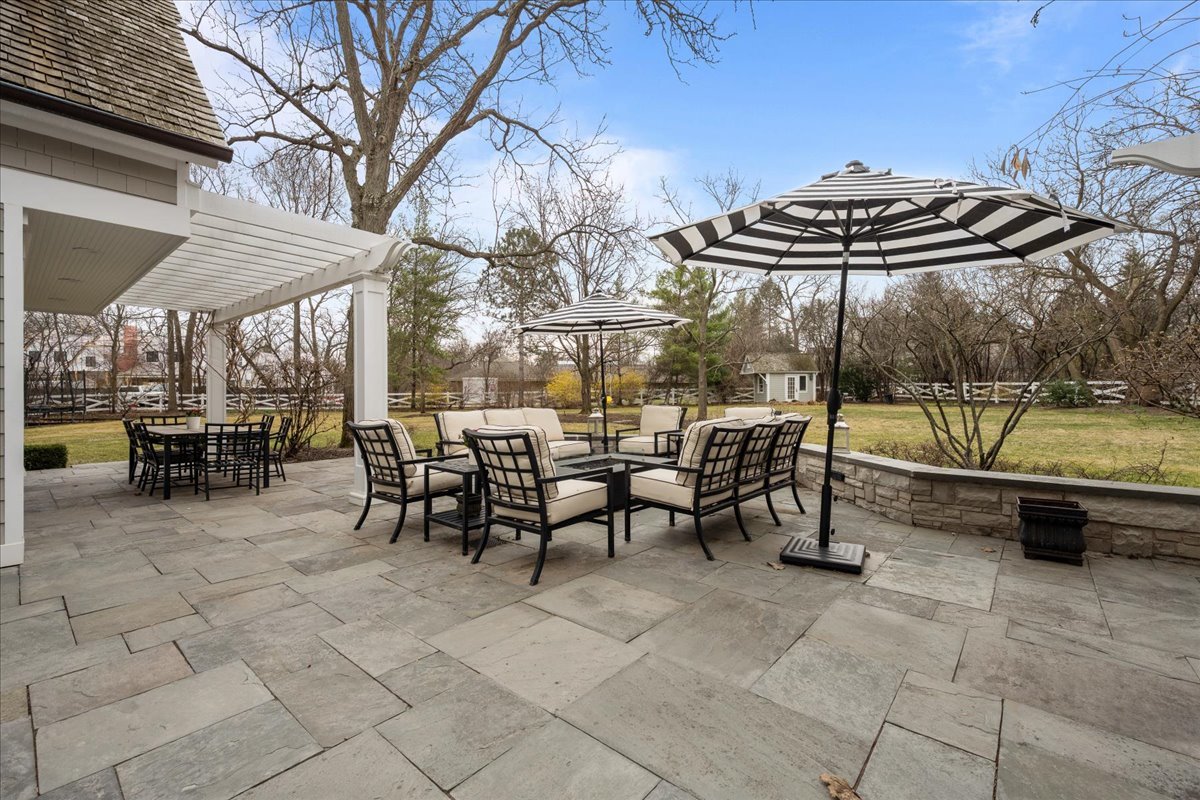 2335 Pebblefork Lane Northfield, IL 60093 - Photo 12 of 92 a view of a chairs and tables in a patio
