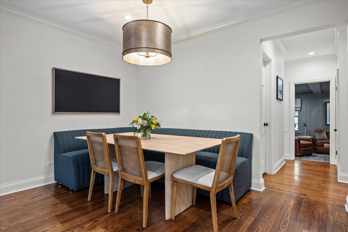 2335 Pebblefork Lane Northfield, IL 60093 - Photo 29 of 92 a view of a dining room with furniture and wooden floor