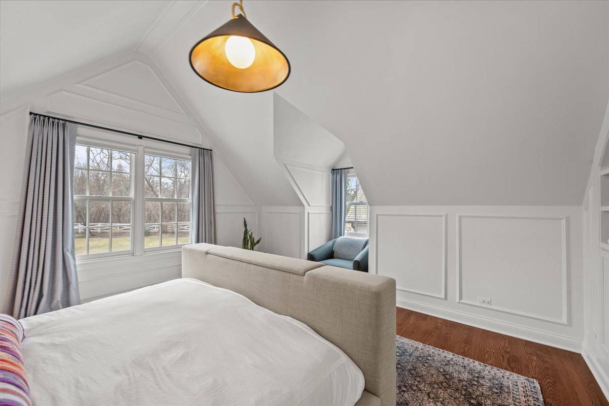 2335 Pebblefork Lane Northfield, IL 60093 - Photo 45 of 92 a bedroom with a bed and a large window