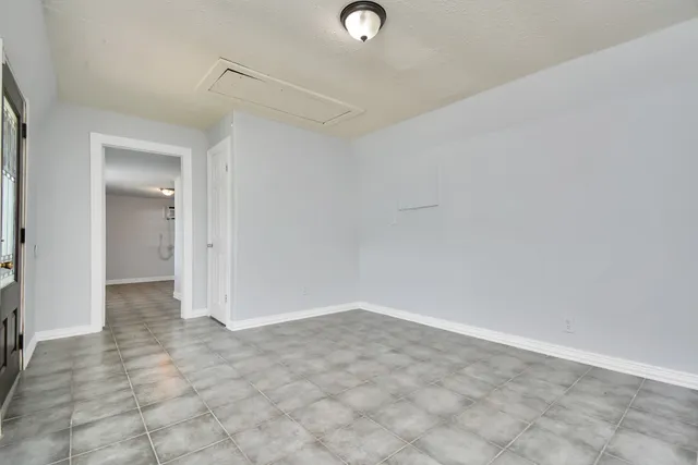 a view of a kitchen with a sink cabinets and a window