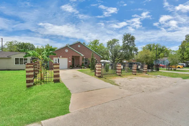 a house with garden in front of it