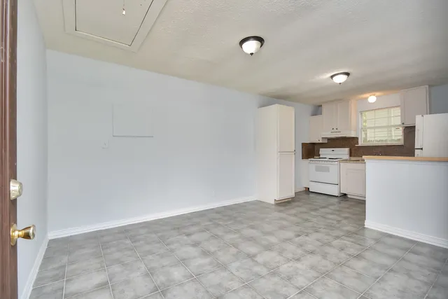 a view of a kitchen with a sink