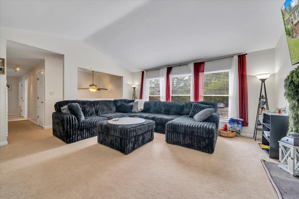 7851 Cedar Edge Road Roanoke, VA 24018 - Photo 6 of 44 a living room with furniture and a large window