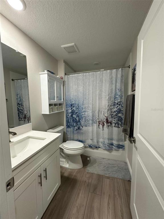 6245 Southwest 96th Place Ocala, FL 34476 - Photo 19 of 38 a bathroom with a sink a toilet and shower