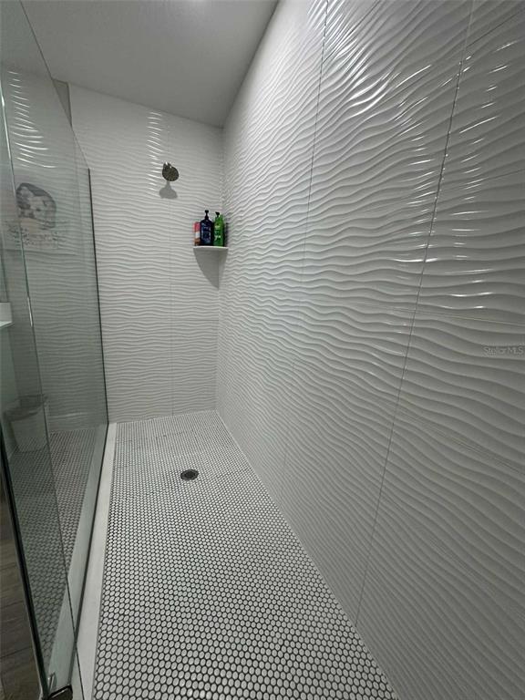 6245 Southwest 96th Place Ocala, FL 34476 - Photo 26 of 38 a bathroom with a shower