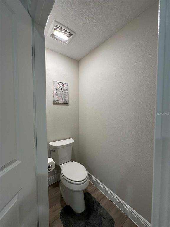 6245 Southwest 96th Place Ocala, FL 34476 - Photo 29 of 38 a bathroom with a toilet