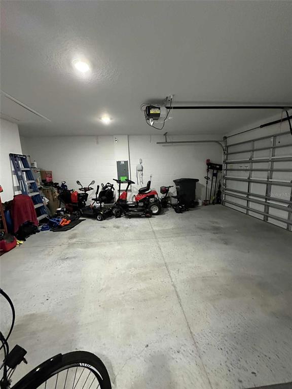 6245 Southwest 96th Place Ocala, FL 34476 - Photo 31 of 38 a view of a garage with storage