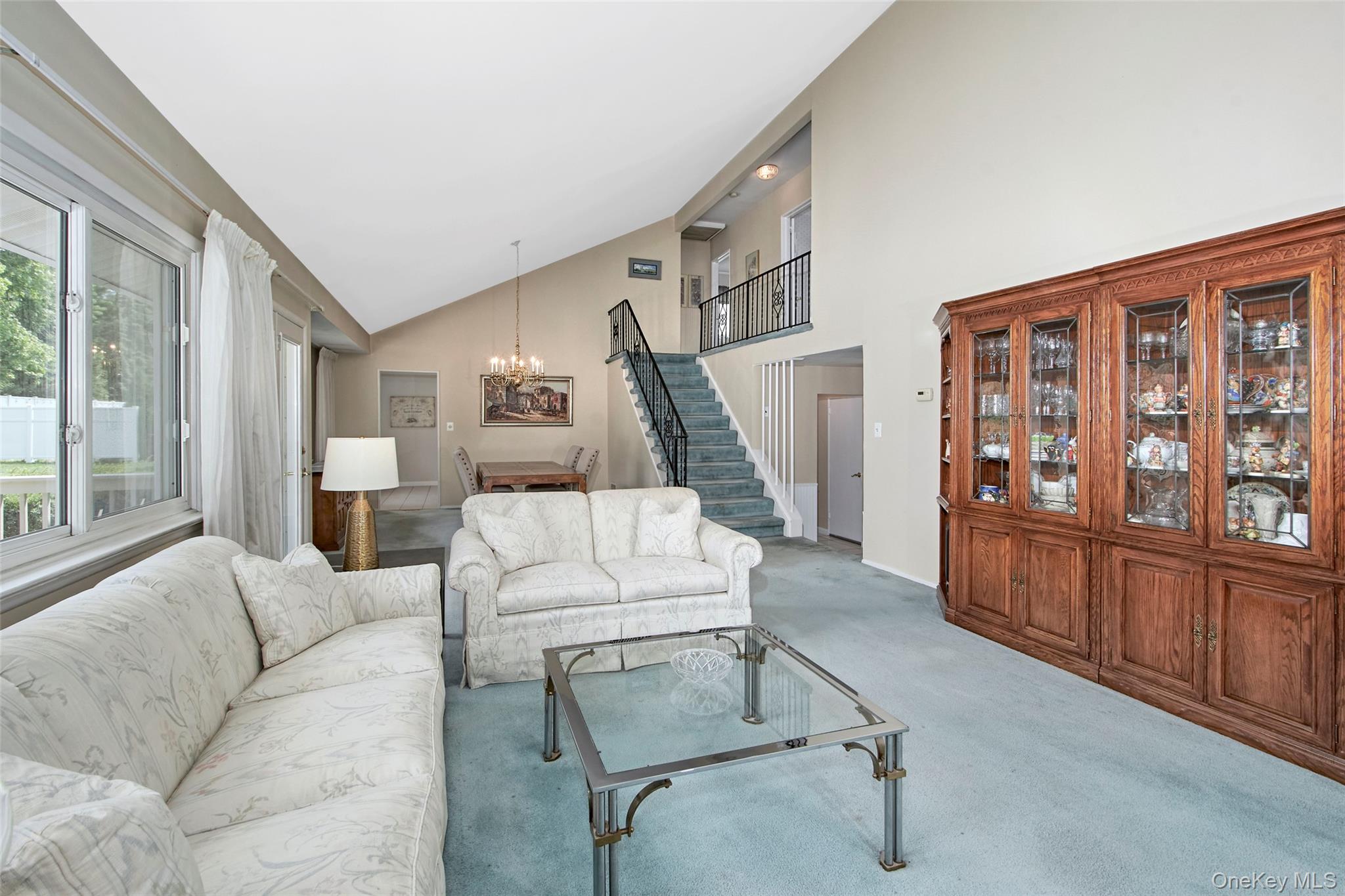 3 Bonwit Road Rye Brook, NY 10573 - Photo 9 of 31 View of dining room and central staircase to bedrooms or potential office