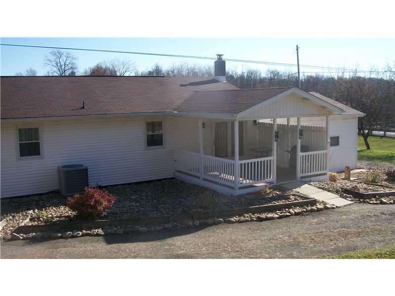 1515 Blue Star Road Perryopolis, PA 15473 - Photo 22 of 25 Patio/Deck. French Doors lead from Dining Room area onto covered back porch! Covered back porch is the perfect place for relaxing during those hot summer months!