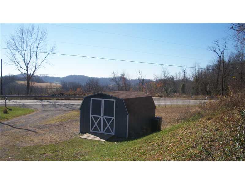 1515 Blue Star Road Perryopolis, PA 15473 - Photo 23 of 25 Stable/Barn. Storage barn is a negotiable item with his home!