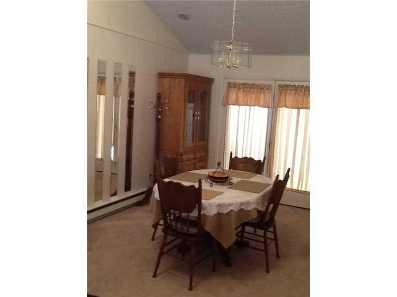 1515 Blue Star Road Perryopolis, PA 15473 - Photo 4 of 25 Dining Room. Vaulted ceiling really opens up this freshly painted dining room.