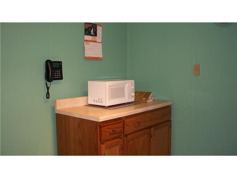 1515 Blue Star Road Perryopolis, PA 15473 - Photo 6 of 25 Kitchen. Sale includes two stoves, two refrigerators AND washer & dryer... PLUS movable kitchen island!