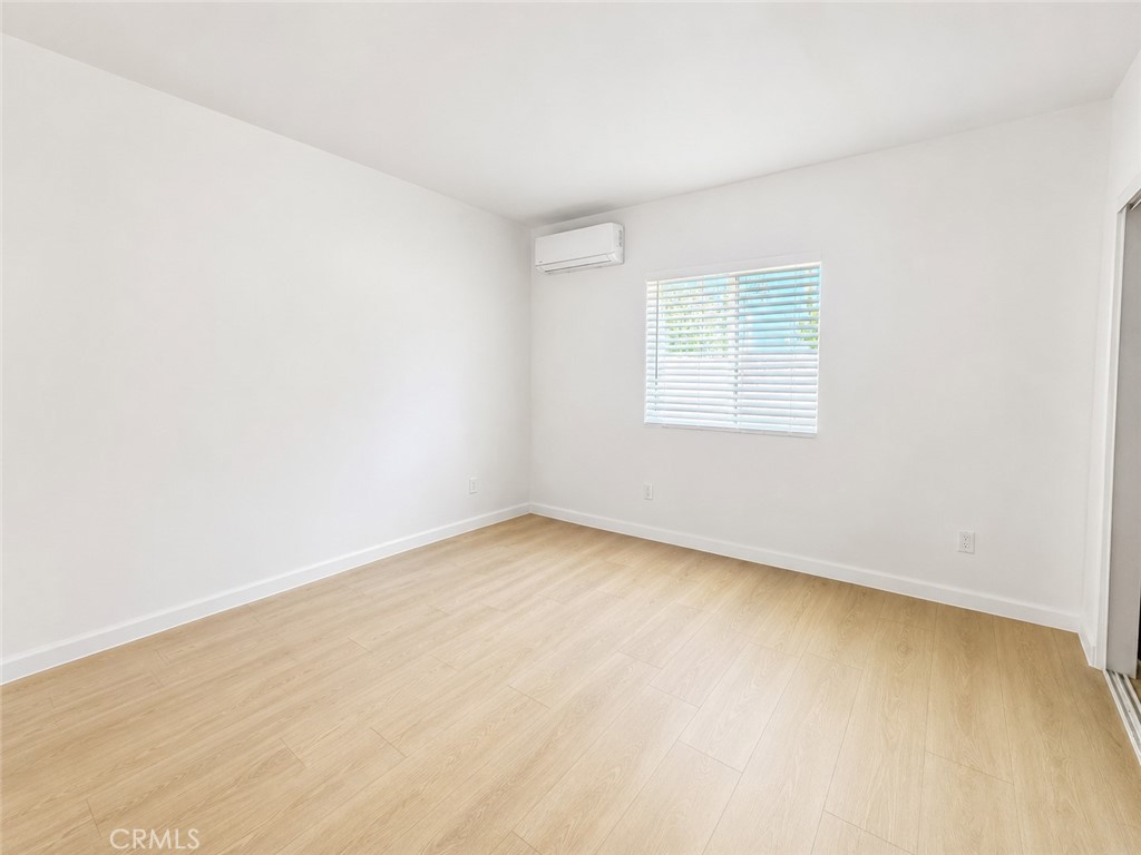 18924 Vose Street Reseda, CA 91335 - Photo 5 of 8 an empty room with a window