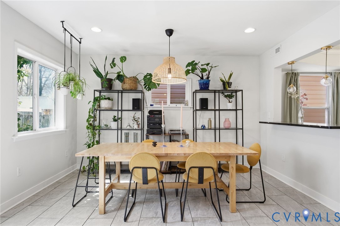 1602 Decatur Street Richmond, VA 23224 - Photo 13 of 25 a dining room with furniture and window
