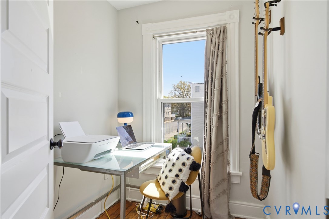 1602 Decatur Street Richmond, VA 23224 - Photo 21 of 25 a view of a dining room with furniture and a window