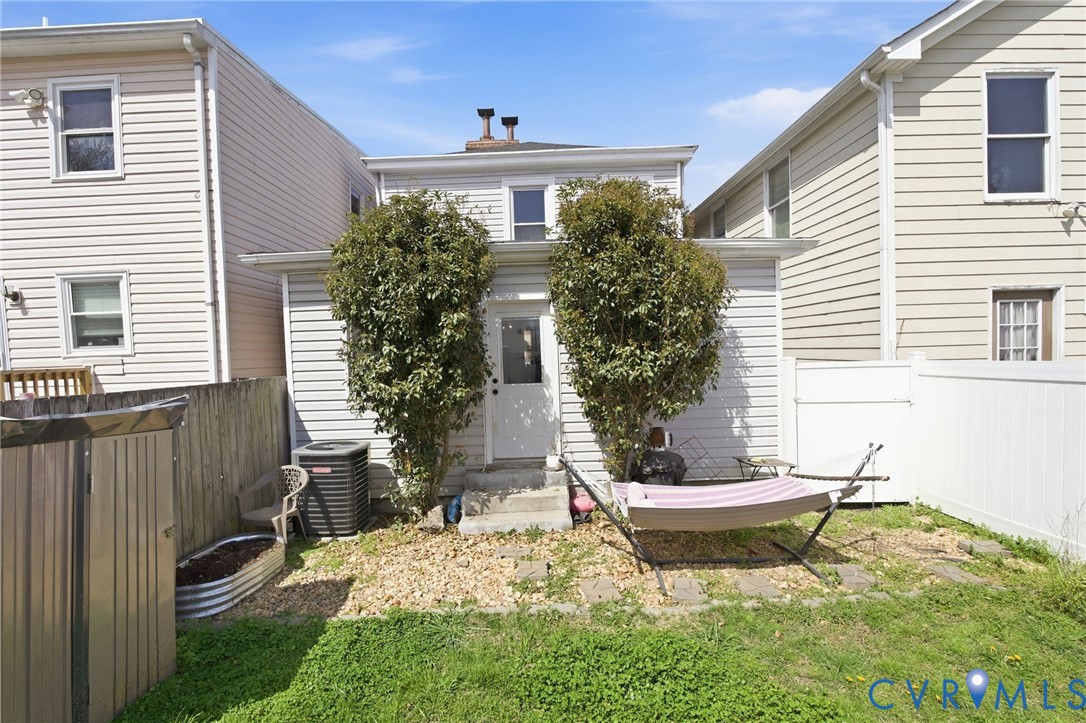 1602 Decatur Street Richmond, VA 23224 - Photo 23 of 25 a house with trees in front of it