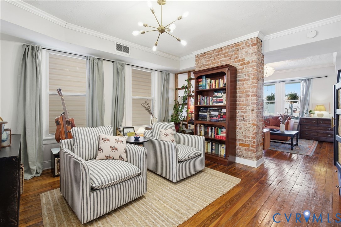 1602 Decatur Street Richmond, VA 23224 - Photo 6 of 25 a living room with furniture and a wooden floor