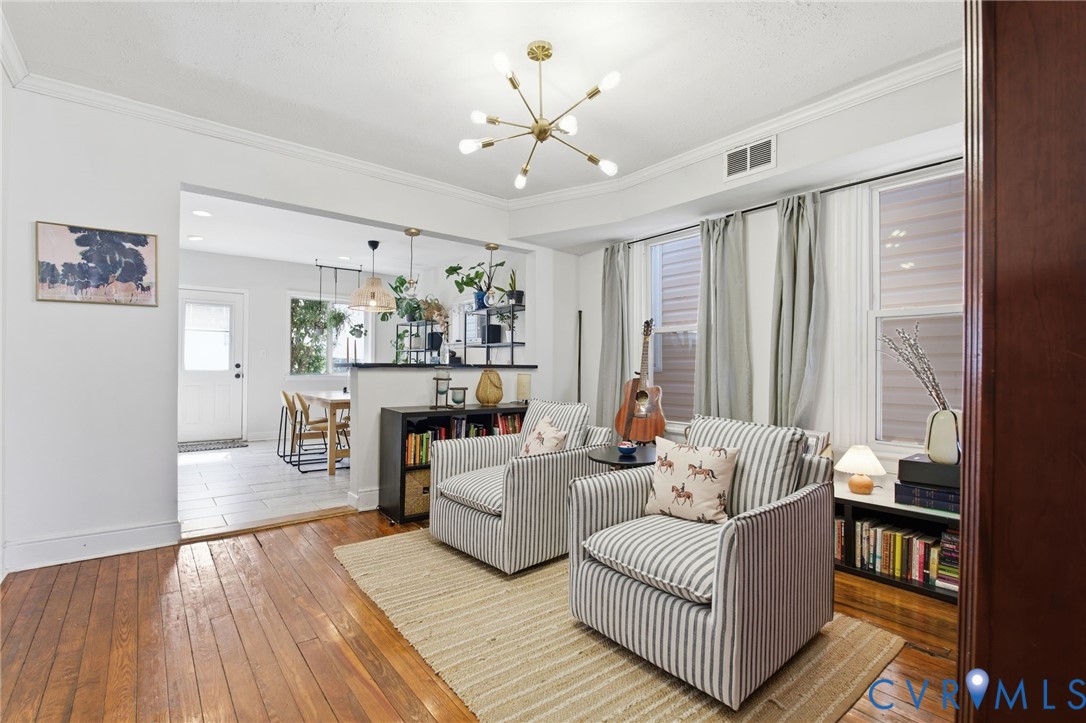 1602 Decatur Street Richmond, VA 23224 - Photo 7 of 25 a living room with furniture and a large window