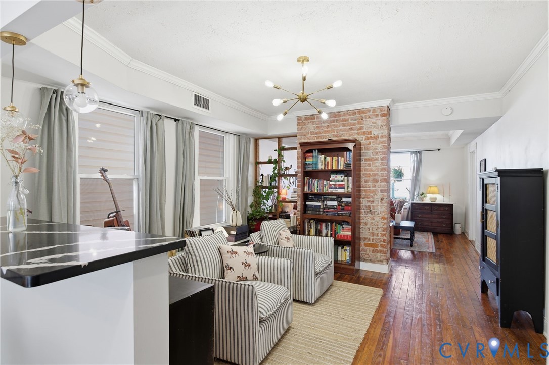 1602 Decatur Street Richmond, VA 23224 - Photo 8 of 25 a living room with furniture and a flat screen tv