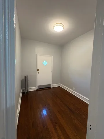 a view of an empty room and window