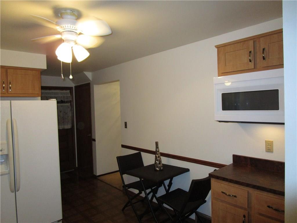 10125 Buchannon Road Pittsburgh, PA 15235 - Photo 4 of 25 Kitchen - There's space for a center island in this kitchen! Space-saving Micro-wave!