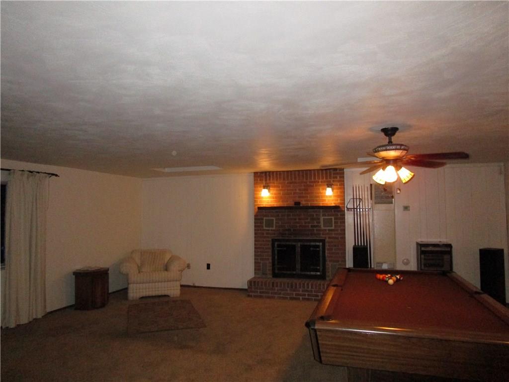10125 Buchannon Road Pittsburgh, PA 15235 - Photo 10 of 25 Man Floor Family Room - Log Burning Fireplace, Negotiable Pool Table!