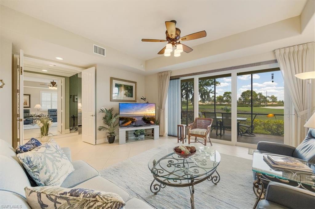8637 Champions Point, Unit 902 Naples, FL 34113 - Photo 6 of 26 Living room with light tile patterned floors, visible vents, recessed lighting, and a ceiling fan