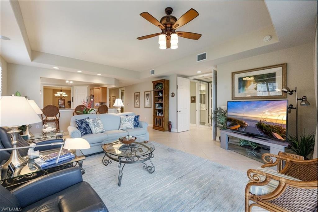 8637 Champions Point, Unit 902 Naples, FL 34113 - Photo 7 of 26 Living room with a ceiling fan, visible vents, recessed lighting, and light tile patterned floors