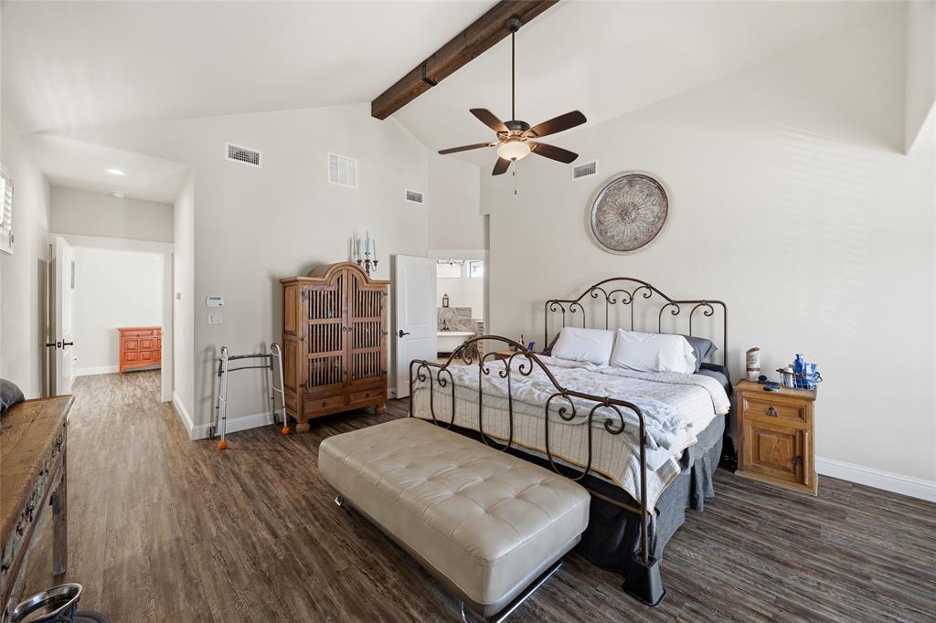 3105 Pastor Street Dallas, TX 75212 - Photo 17 of 28 Bedroom with dark wood finished floors, ceiling fan, and vaulted ceiling