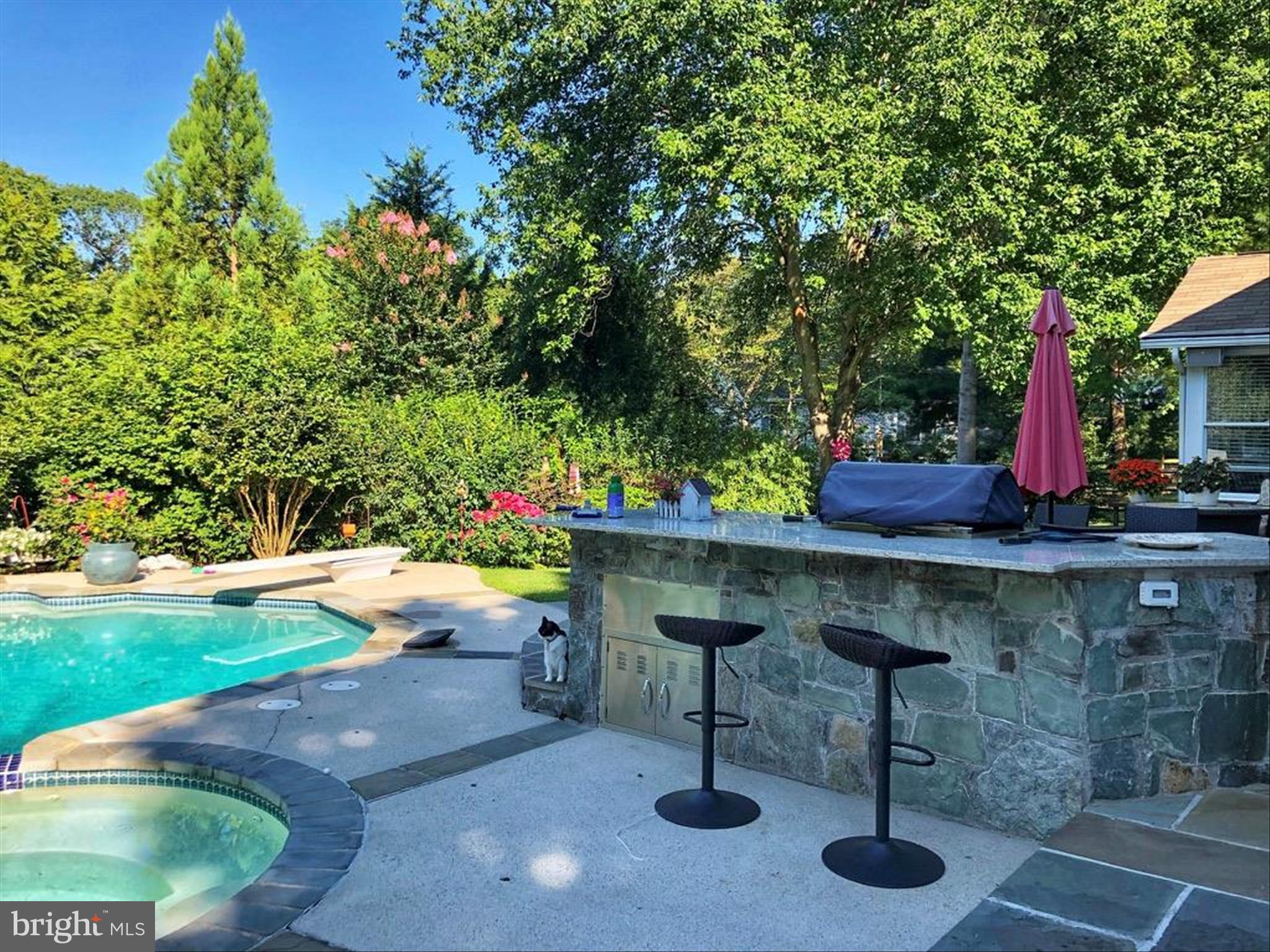 11810 Far Edge Path Columbia, MD 21044 - Photo 54 of 71 Custom Flagstone Patio with Outdoor Kitchen