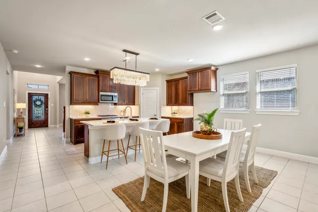 a view of a dining room with furniture