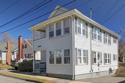 a front view of a building with street