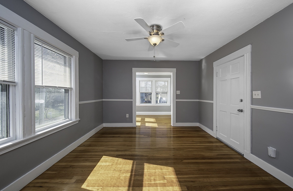 46 Winthrop Avenue Beverly, MA 01915 - Photo 17 of 29 a view of an empty room with wooden floor and a window