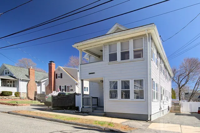 a view of a building with a street