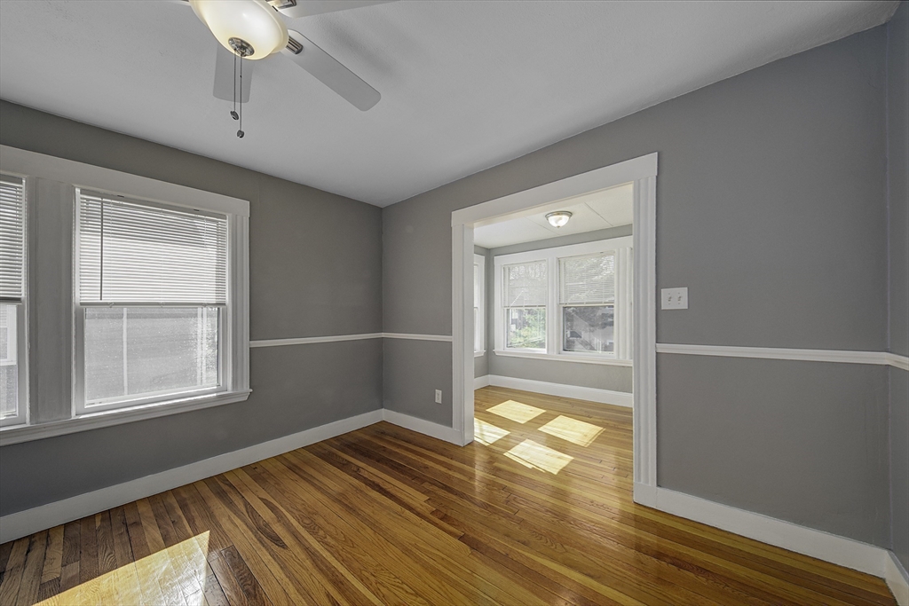 46 Winthrop Avenue Beverly, MA 01915 - Photo 23 of 29 a view of empty room with wooden floor and fan