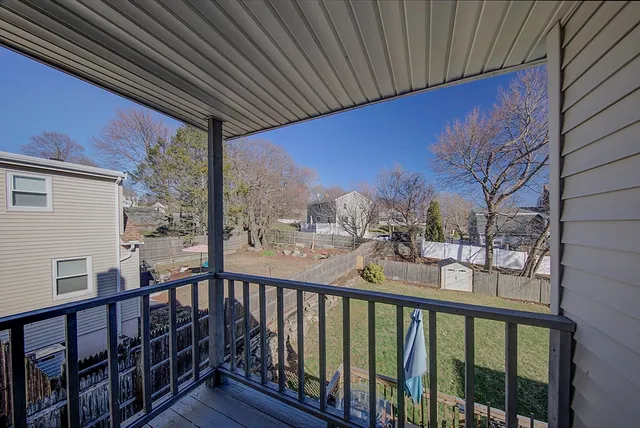 a view of a balcony with a street