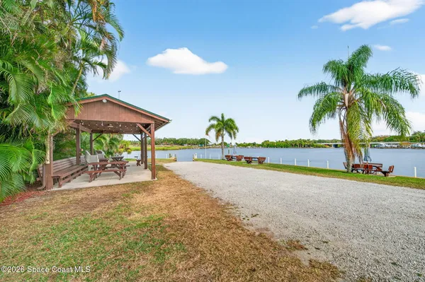a view of a lake with a big yard