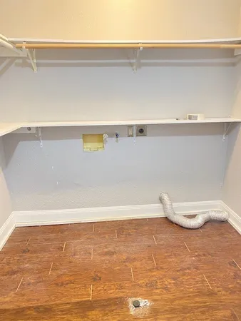 a view of a room with an empty space