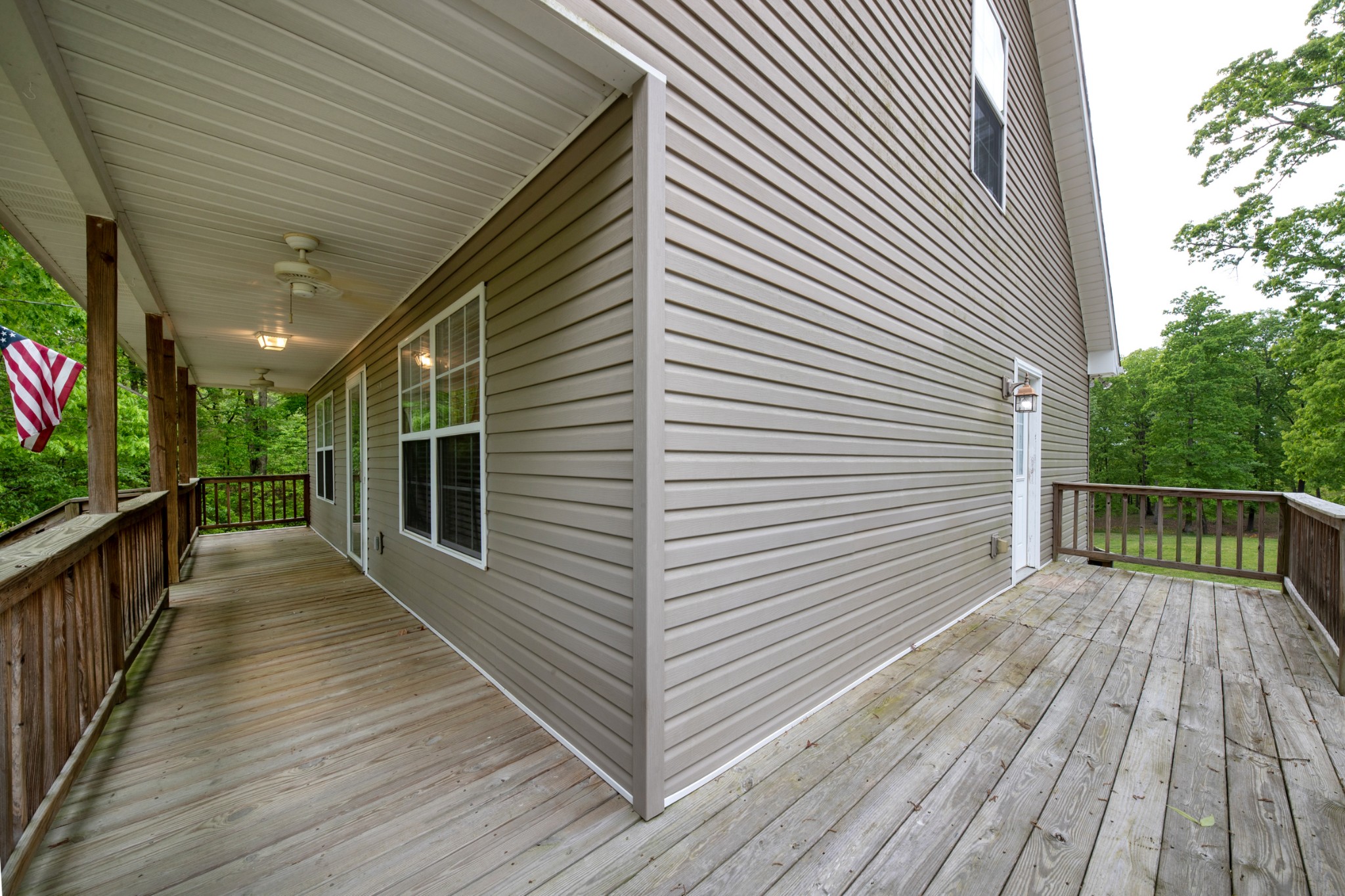 220 Black Road Dickson, TN 37055 - Photo 13 of 36 a view of a balcony with wooden floor and fence