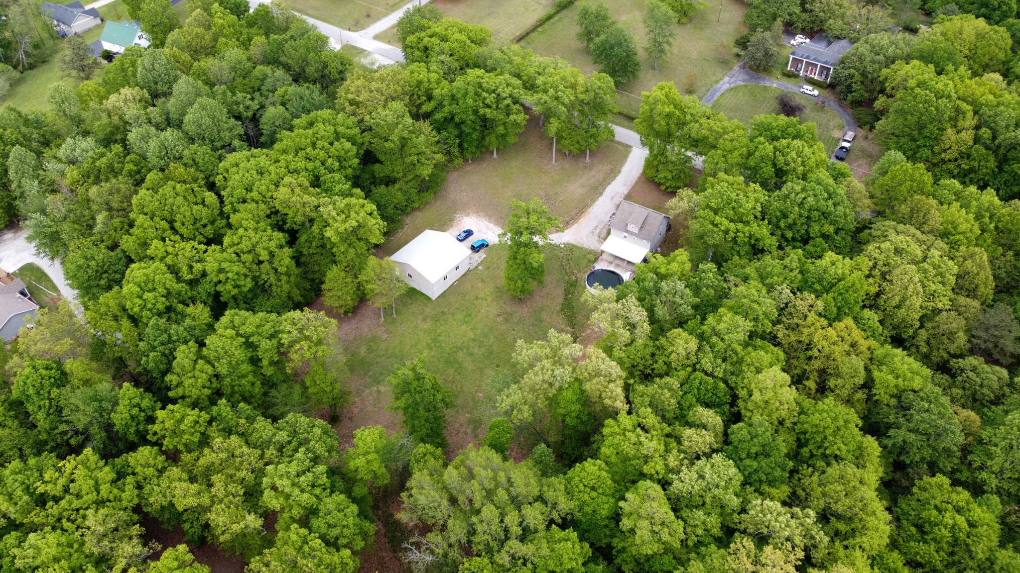 220 Black Road Dickson, TN 37055 - Photo 5 of 36 an aerial view of a house with a yard