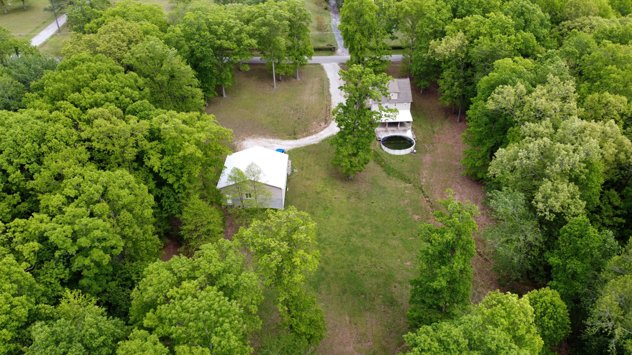 220 Black Road Dickson, TN 37055 - Photo 6 of 36 an aerial view of a house with pool outdoor seating and yard