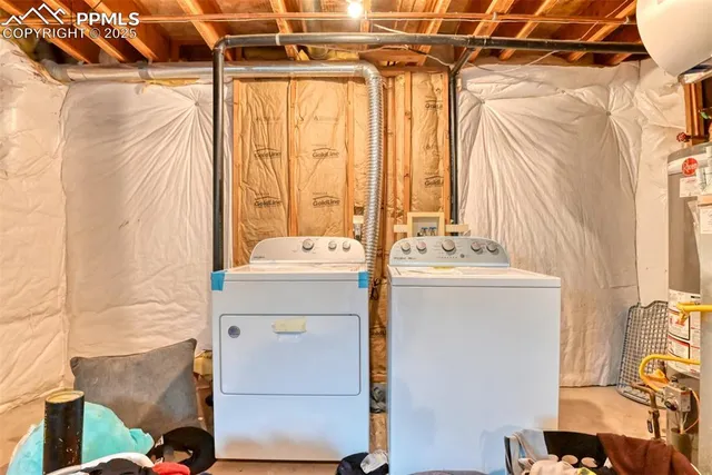 a bathroom with a sink mirror and a shower