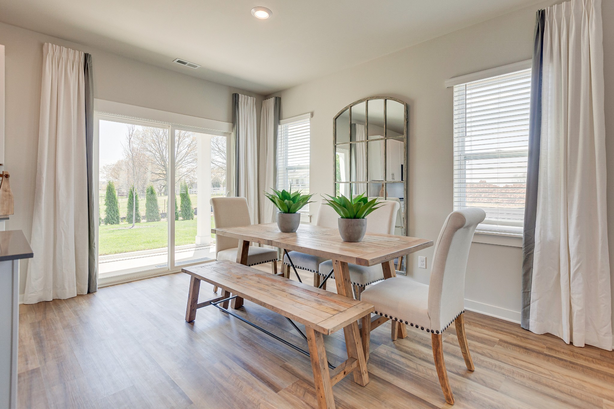 205 Gold Finch Rd Mount Mount Juliet, TN 37122 - Photo 8 of 25 a view of a dining room with furniture window and wooden floor