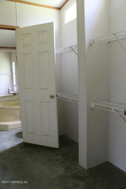 15577 Flounder Road Jacksonville, FL 32226 - Photo 13 of 35 a bathroom with a shower